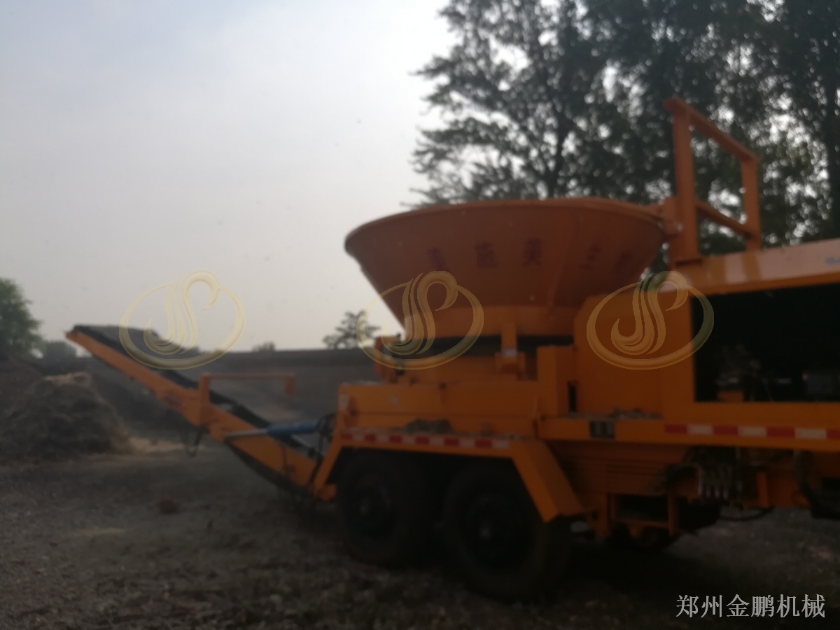 郑州金鹏树根削片机器选型与大尺寸硬质木料预粉碎处理方案